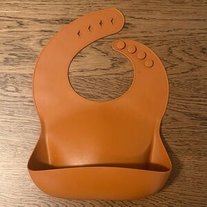 Mushie Silicone Baby Bib with Crumb Catcher - Orange